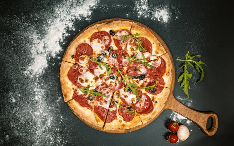 Prosciutto arugula coal fired pizza